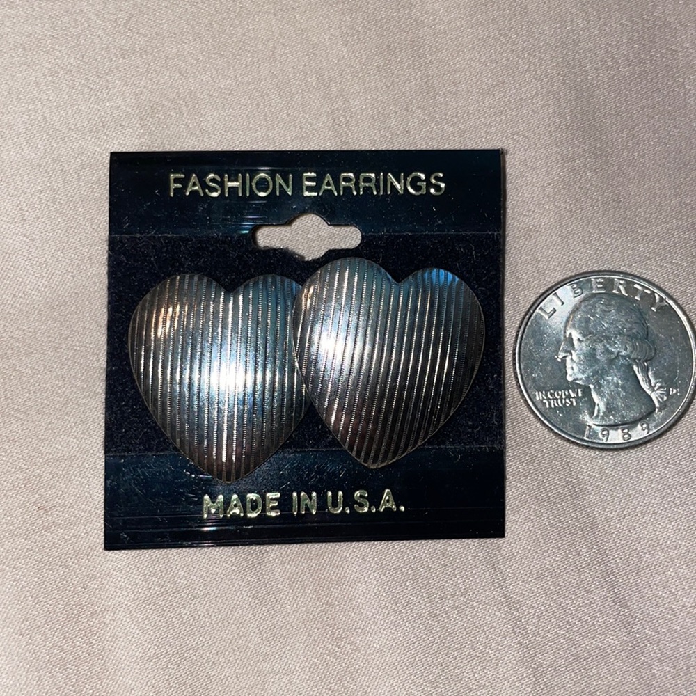 Silver lined heart shaped earrings
